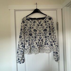 White and blue floral tiered blouse with lace trim